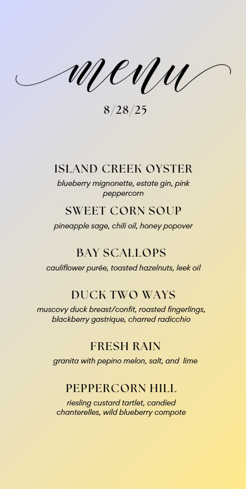 Printed seasonal tasting menu on a yellow card